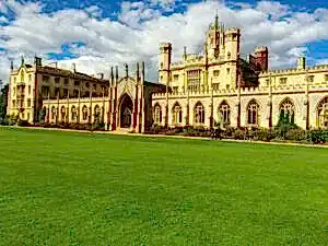 beige concrete building under blue sky during daytime